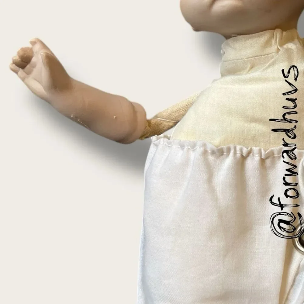 Wind-Up Musical Porcelain Doll – Moving Head & Arms - UNKNOWN AGE